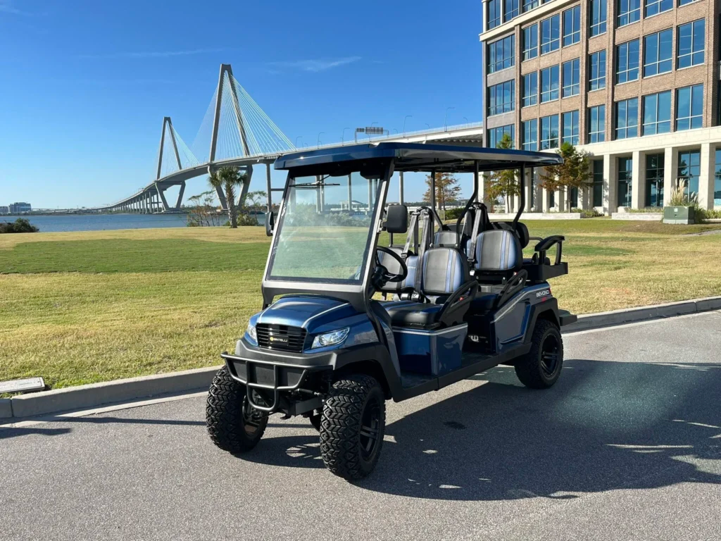 Navy blue 6-passenger lifted LSV golf cart